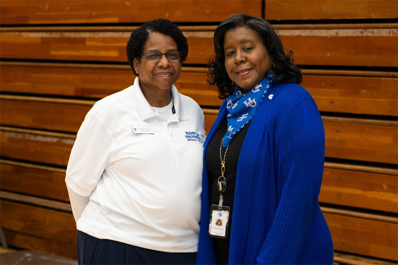 Two faculty clinicians pose for the camera.