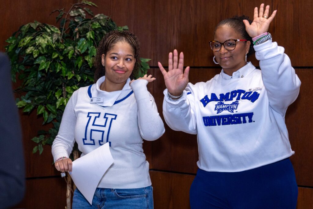 HU alumni Hayley Lawton '20, and Gayle Powell make the scholarship announcement